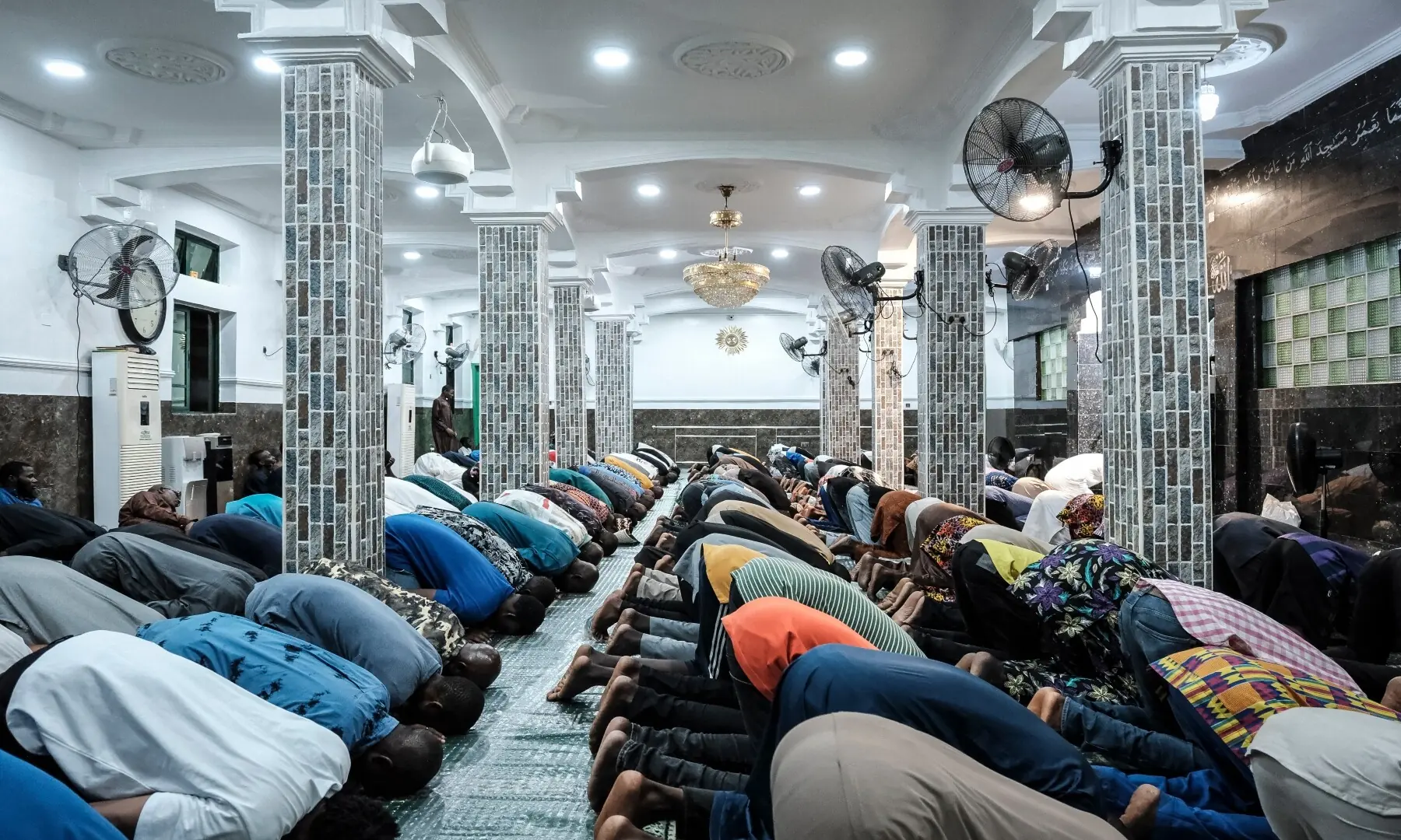 Muslim worshippers perform the evening prayer on the first day of Ramazan at the Nadwat Global Assembly Mosque in Lagos Island on February 18, 2026. &mdash; Oyewole Lawal / AFP