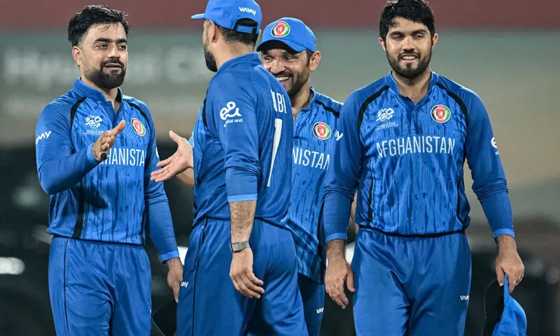 Afghanistan&rsquo;s captain Rashid Khan (L) celebrates with teammates his team&rsquo;s win at the end of the 2026 ICC Men&rsquo;s T20 Cricket World Cup group stage match between Afghanistan and Canada at the MA Chidambaram Stadium in Chennai on February 19, 2026.  &mdash; AFP