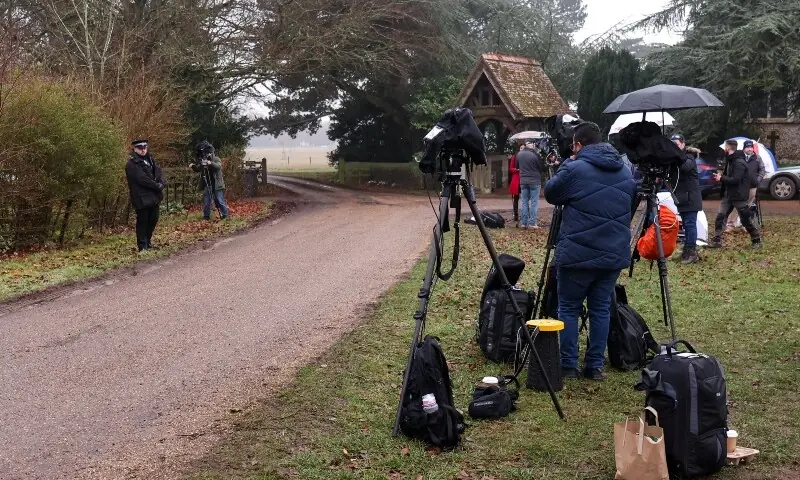 Members of the media work outside the entrance to the Wood Farm on the Sandringham Estate, which is reported to be serving as interim accommodation for Andrew Mountbatten Windsor, younger brother of Britain&rsquo;s King Charles, formerly known as Prince Andrew, who was arrested this morning on suspicion of misconduct in public office, after the U.S. Justice Department released more records tied to the late financier and convicted sex offender Jeffrey Epstein, in Norfolk, Britain, February 19, 2026.