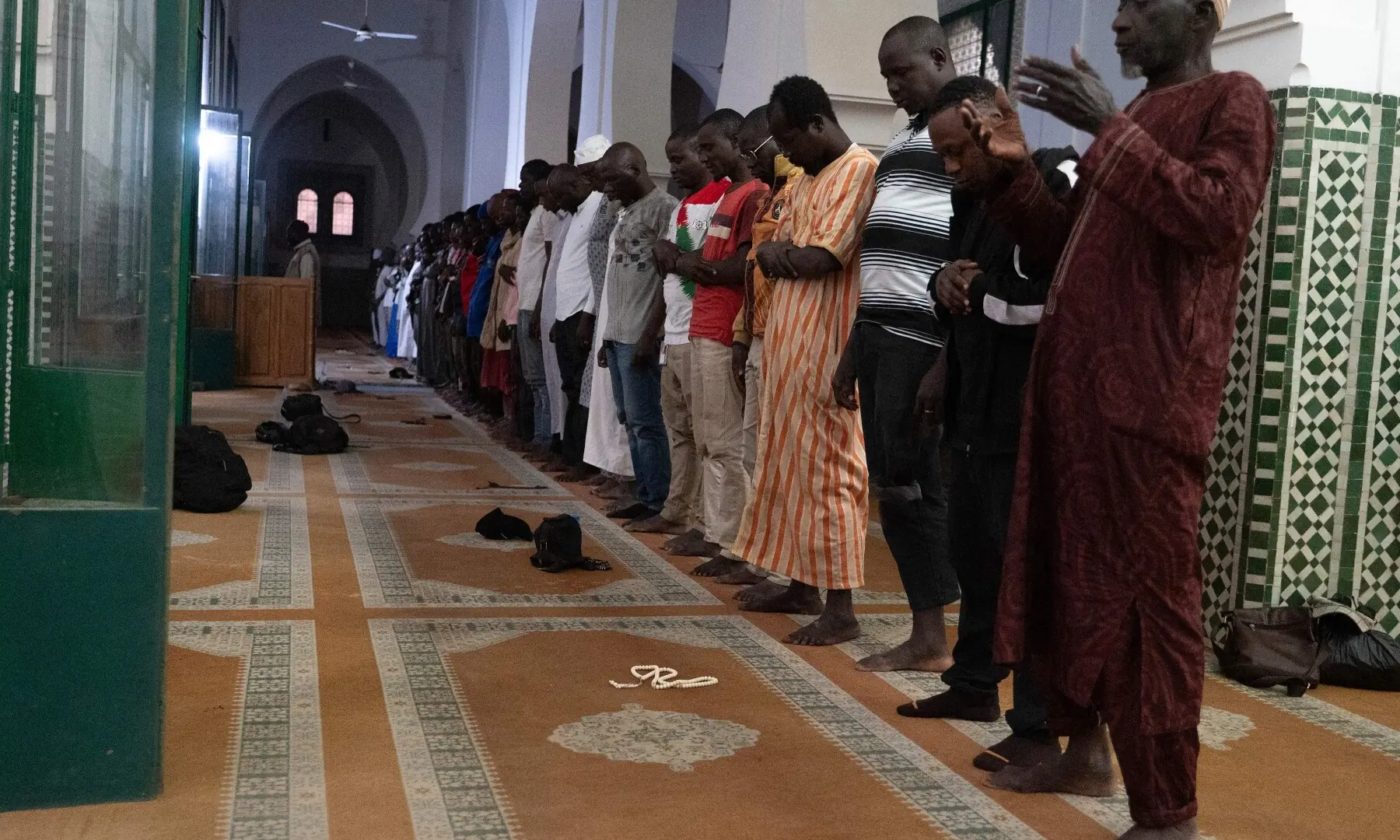 Muslim worshippers pray inside the Grand Mosque in Dakar, on February 19, 2026, during the Muslim holy fasting month of Ramazan. Muslims throughout the world are marking the month of Ramadan, the holiest month in the Islamic calendar, during which devotees fast from dawn until dusk. &mdash;AFP