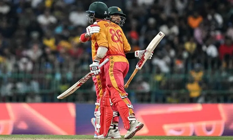 Zimbabwe&rsquo;s Brian Bennett (front) celebrates with his captain Sikandar Raza after scoring a half-century (50 runs) during the 2026 ICC Men&rsquo;s T20 Cricket World Cup group stage match between Sri Lanka and Zimbabwe at the R Premadasa Stadium in Colombo on February 19, 2026. &mdash; AFP