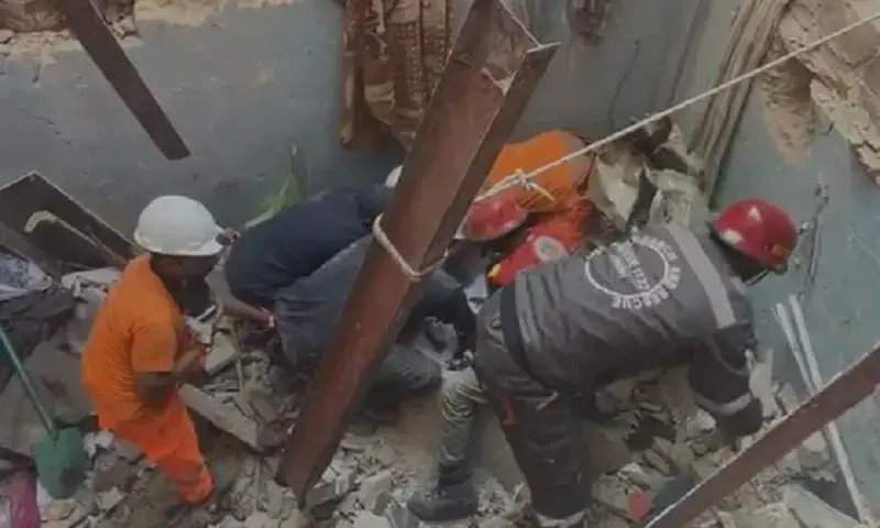 Rescue personnel sift through the rubble of the building following the collapse. — Rescue 1122 Rescue personnel sift through the rubble of the building following the collapse. — Rescue 1122