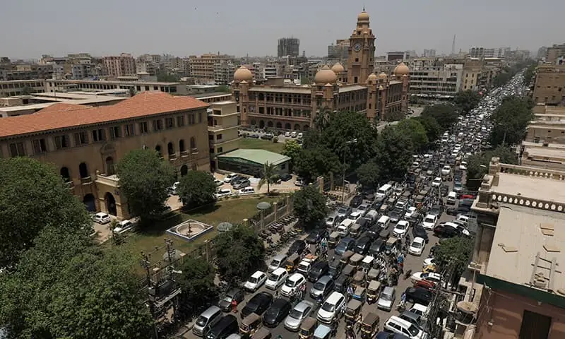 A general view of road traffic and the Karachi Metropolitan Corporation (KMC) building in the background in Karachi, May 11, 2020. &mdash; Reuters