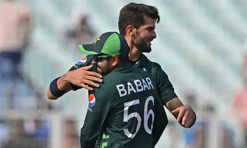Pakistan&rsquo;s Shaheen Shah Afridi (R) celebrates with captain Babar Azam after taking the wicket of Bangladesh&rsquo;s Tanzid Hasan during the 2023 ICC Men&rsquo;s Cricket World Cup one-day international (ODI) match between Pakistan and Bangladesh at the Eden Gardens in Kolkata on October 31, 2023. &mdash; AFP/File