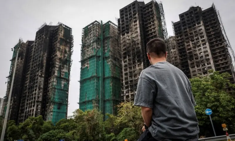 J Wong, son of Wong, a 71-year-old man whose image was captured during the deadly Wang Fuk Court fire, poses for a photo near the housing complex during an interview in Tai Po, Hong Kong, China on Nov 30, 2025. — Reuters/File J Wong, son of Wong, a 71-year-old man whose image was captured during the deadly Wang Fuk Court fire, poses for a photo near the housing complex during an interview in Tai Po, Hong Kong, China on Nov 30, 2025. — Reuters/File