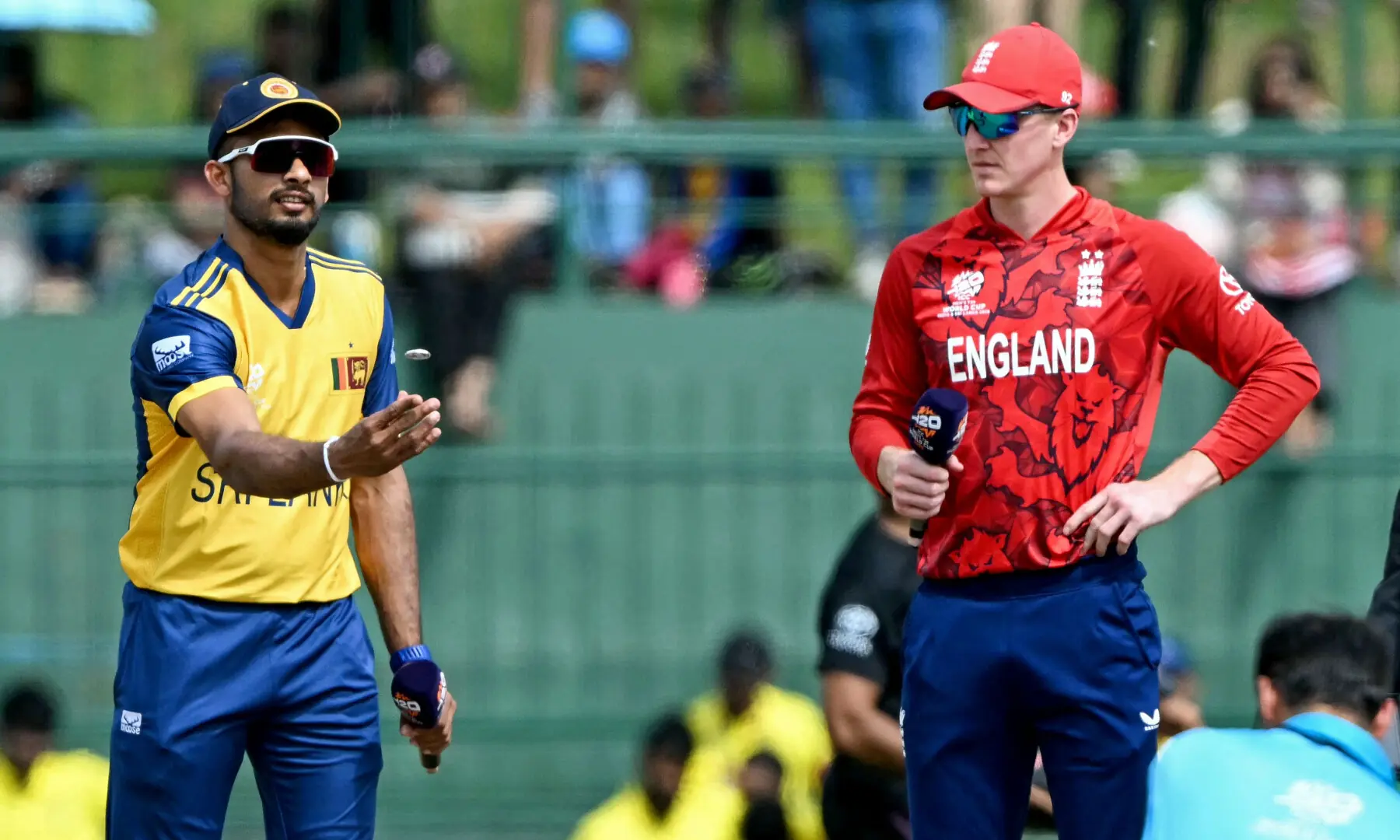 Sri Lanka&rsquo;s captain Dasun Shanaka (L) tosses the coin alongside his England counterpart Harry Brook before the start of the 2026 ICC Men&rsquo;s T20 Cricket World Cup Super Eights match between Sri Lanka and England at Pallekele International Cricket Stadium in Kandy on Feb 22, 2026. &mdash; AFP
