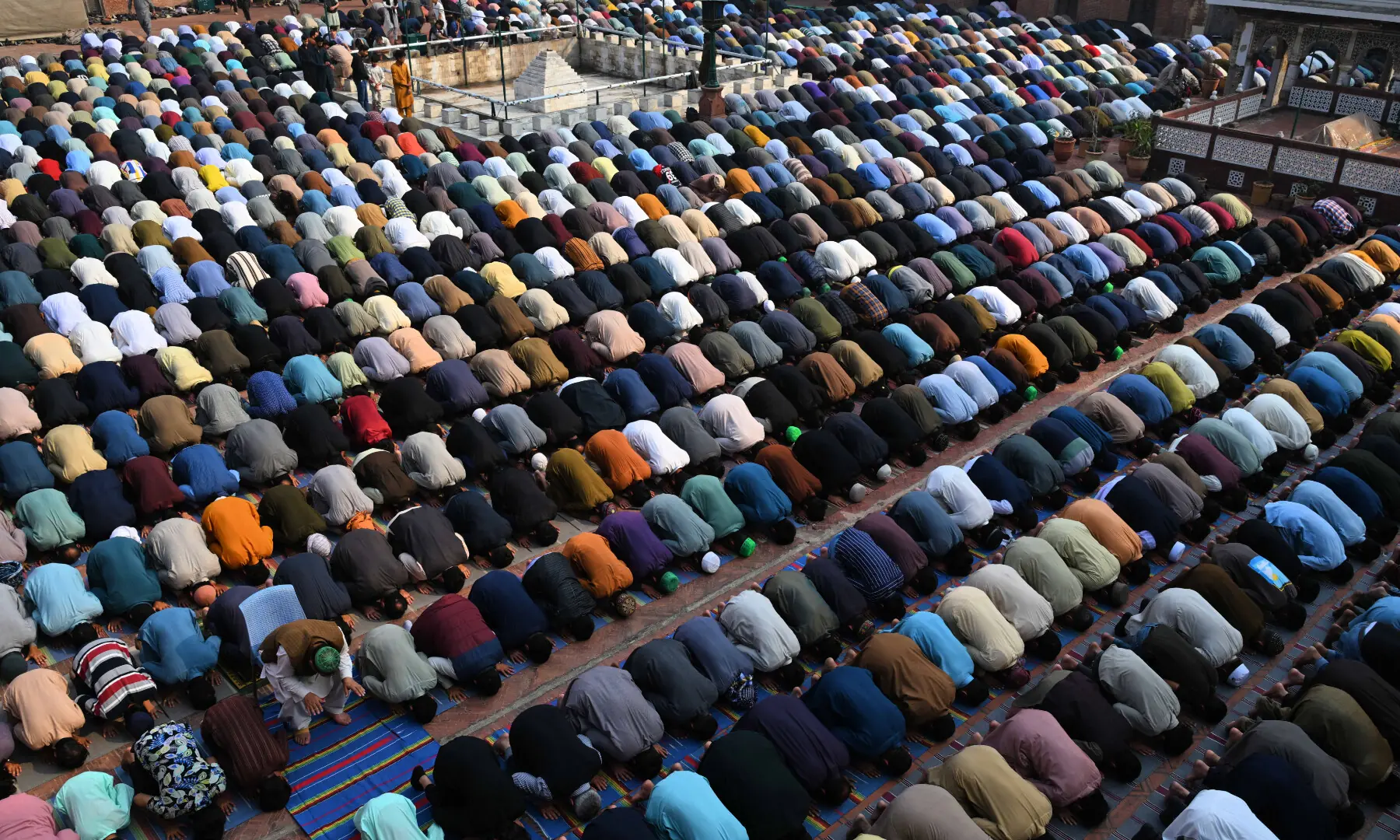 Muslim devotees offer the first Friday prayers during the Islamic holy fasting month of Ramazan at Lahore&rsquo;s Wazir Khan Mosque. &mdash;  Arif Ali / White Star