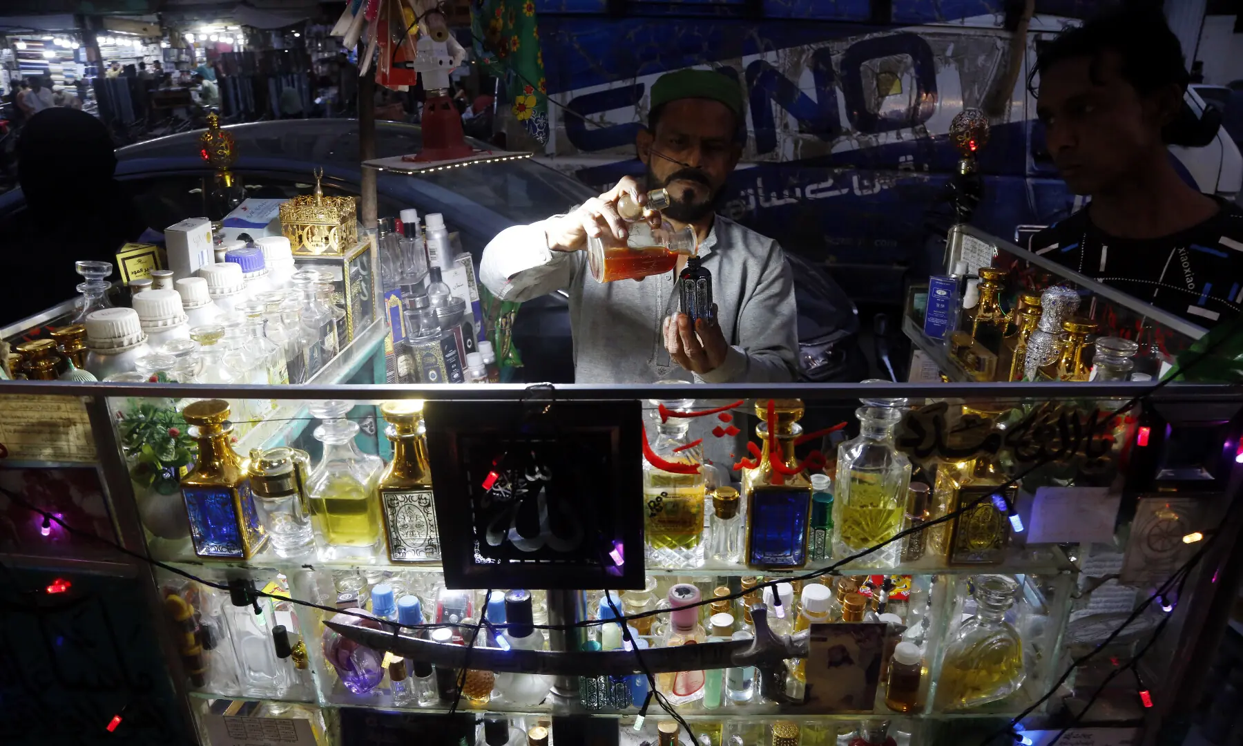 Hats, tasbeehs and ittars are being sold near Memon Mosque in Karachi in connection with Ramazan. &mdash; Shakil Adil / White Star