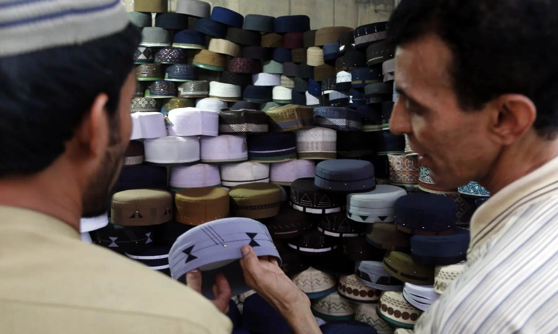 Hats, tasbeehs and ittars are being sold near Memon Mosque in Karachi in connection with Ramazan. &mdash;  Shakil Adil / White Star