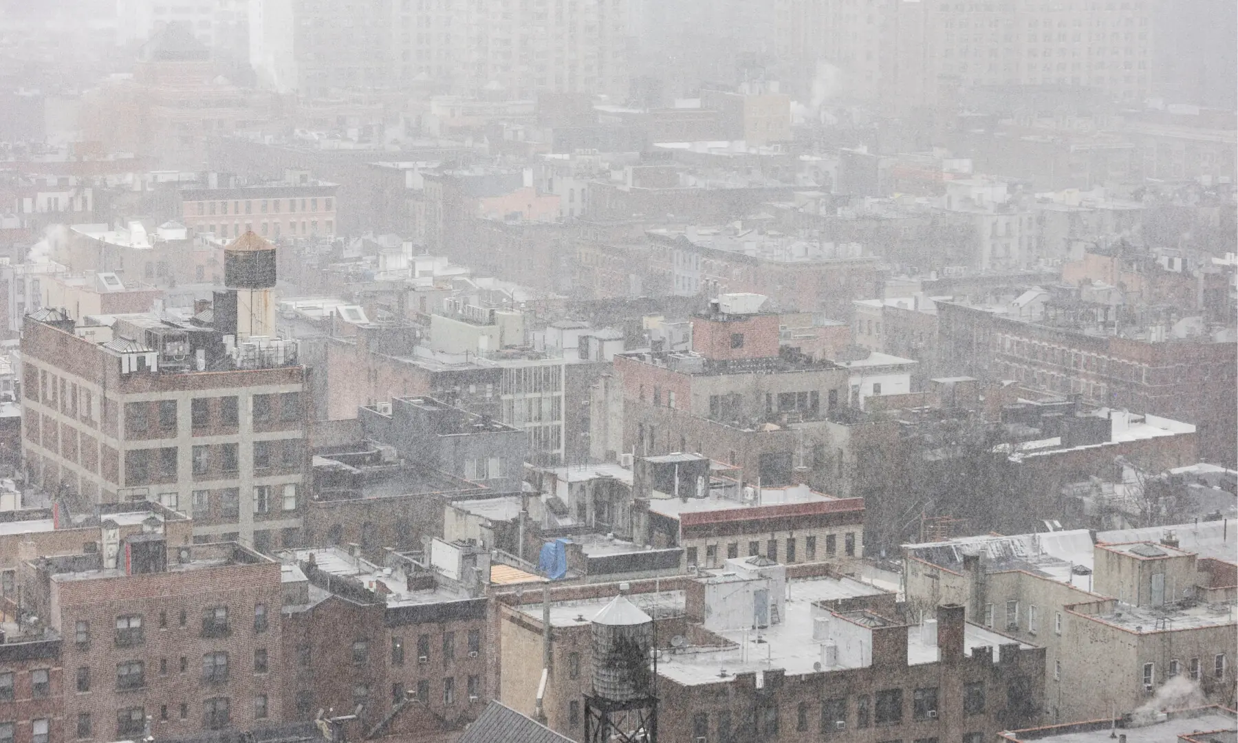 Snow covers residential buildings during a winter storm in the Brooklyn Borough of New York City, US on Feb 22, 2026. &mdash; Reuters