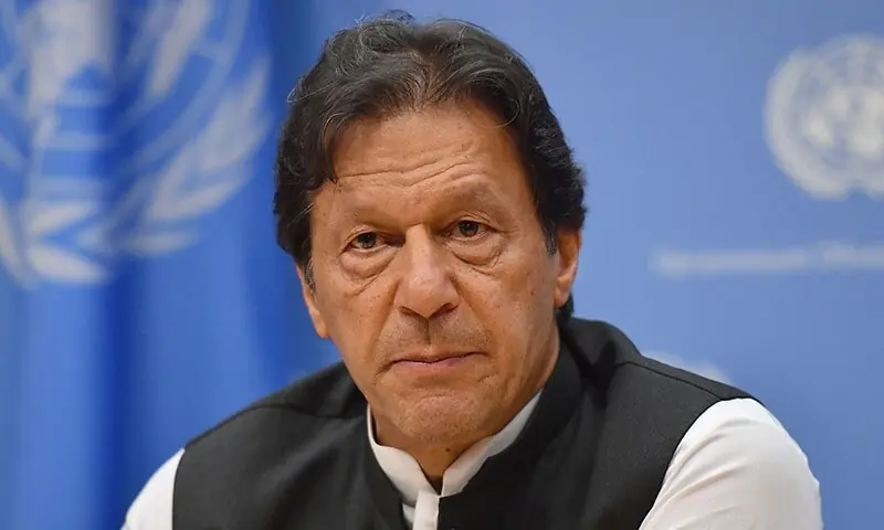 Now-incarcerated PTI leader Imran Khan addresses a press conference in New York in September 2019. &mdash; AFP/File