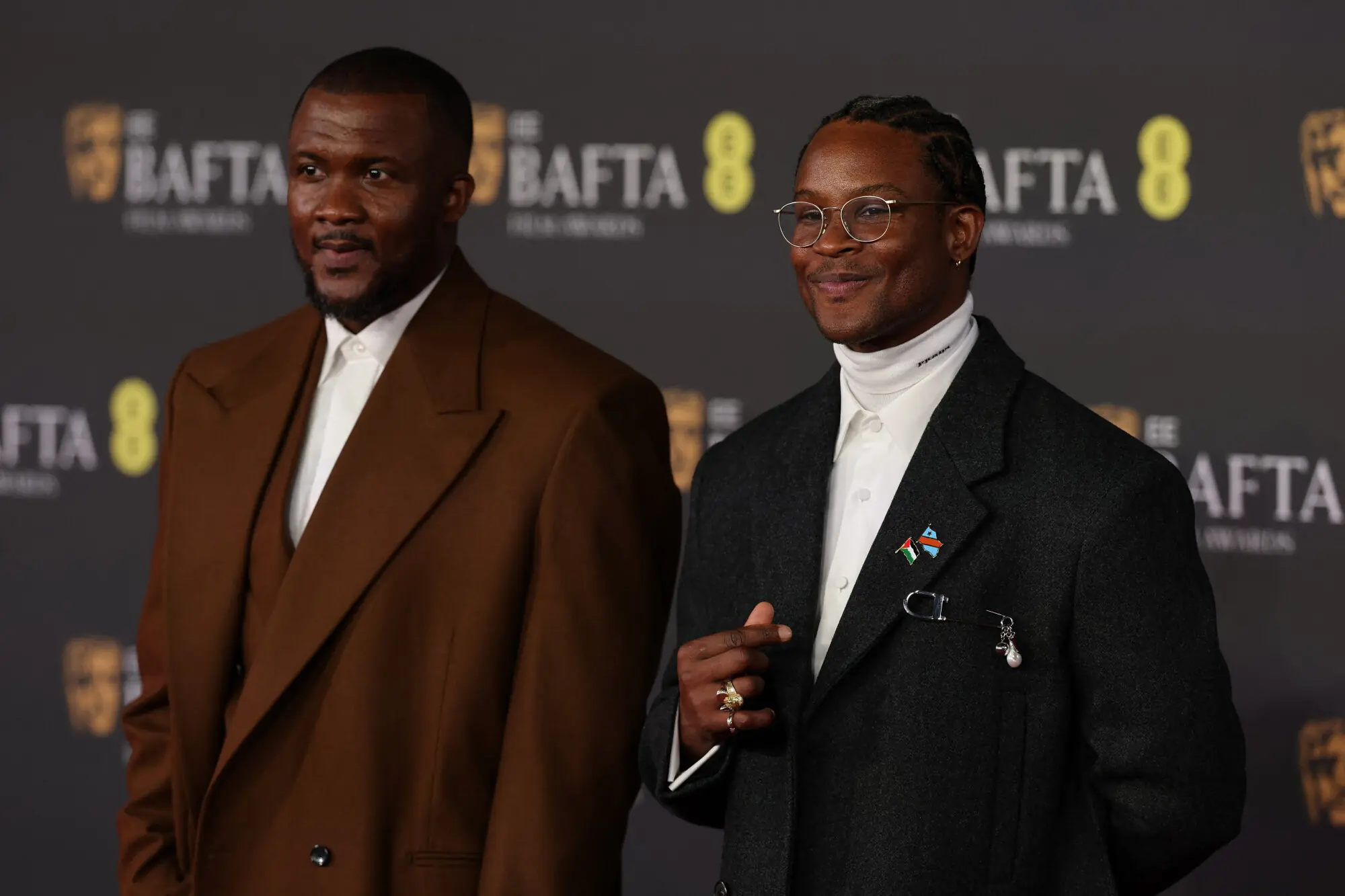  British writer Wales Davies and British-Nigerian director and writer Akinola Davies Jr. poses on the red carpet upon arrival at the BAFTA British Academy Film Awards at the Royal Festival Hall. Photo: AFP 