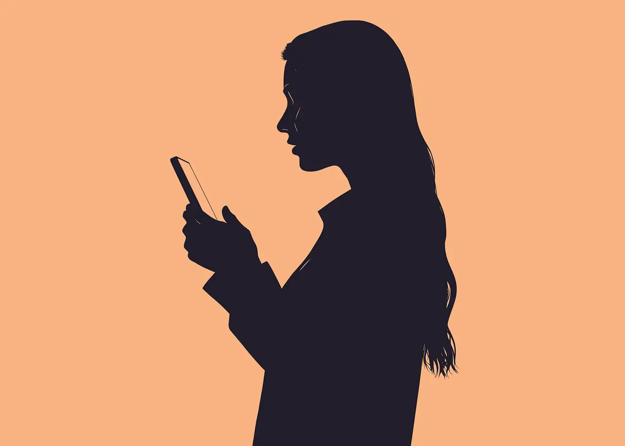 Illustration showing a woman holding her phone. — Mohamed Hassan /Pixabay