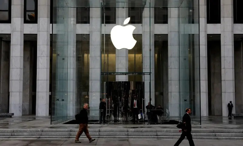 In this file photo, the Apple Inc. logo is seen hanging at the entrance to the Apple store on 5th Avenue in Manhattan, New York, US on October 16, 2019. &mdash; Reuters/File