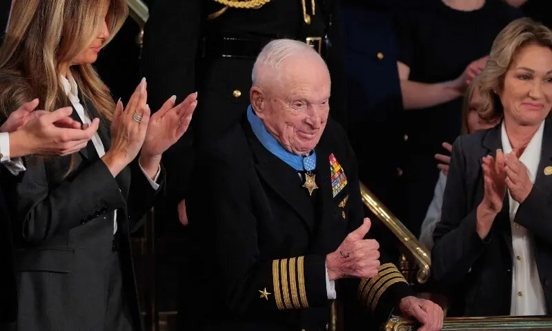 Retired Navy Captain E. Royce Williams acknowledges applause after receiving the Medal of Honor from first lady Melania Trump during U.S. President Trump&rsquo;s State of the Union address during a Joint Session of Congress at the US Capitol on February 24, 2026, in Washington, DC. &mdash;AFP