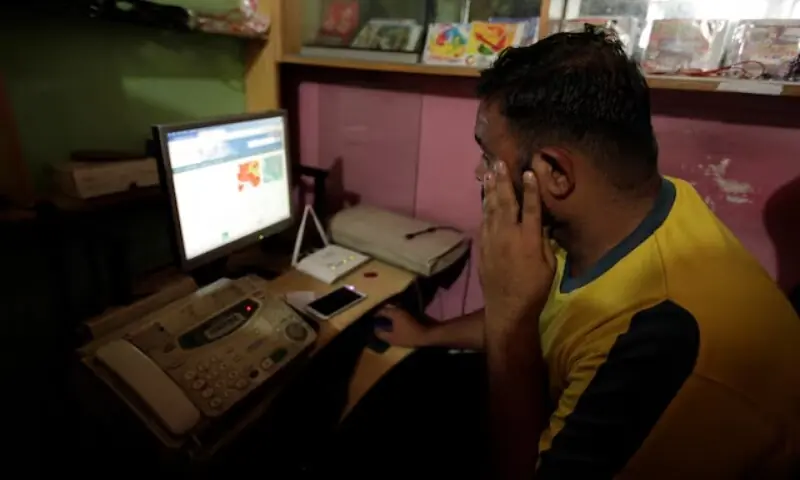 A man explores social media on a computer at an internet club in Islamabad, Pakistan, August 11, 2016. &mdash; Reuters
