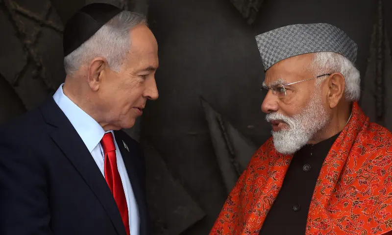 India&rsquo;s Prime Minister Narendra Modi (R) speaks with his Israeli counterpart Benjamin Netanyahu after paying respect before the eternal flame at the Hall of Remembrance during his visit to the Yad Vashem Holocaust Memorial Museum in Jerusalem on Feb 26, 2026. &mdash; AFP