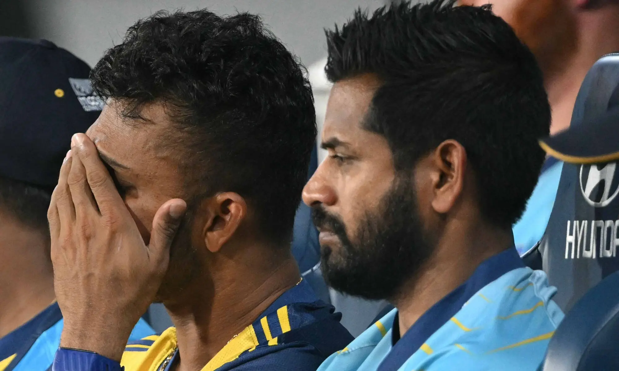 Sri Lanka&rsquo;s captain Dasun Shanaka (L) reacts as he sits in the team dug-out during the 2026 ICC Men&rsquo;s T20 Cricket World Cup Super Eights match between Sri Lanka and New Zealand at the R Premadasa Stadium in Colombo on February 25, 2026. &mdash; AFP