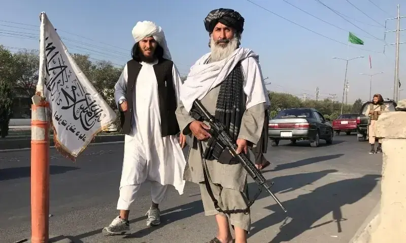 Taliban fighters stand outside the Interior Ministry in Kabul on August 16, 2021. &mdash; Reuters/File