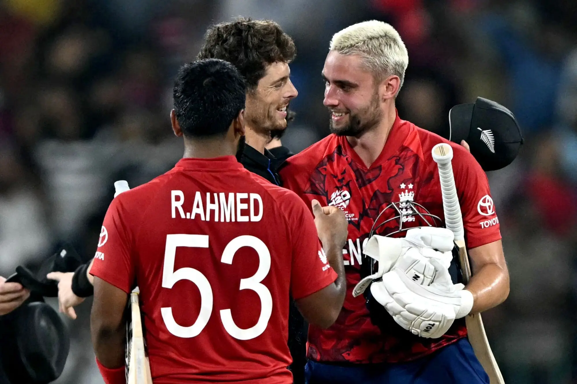New Zealand&rsquo;s captain Mitchell Santner (C) congratulates England&rsquo;s Will Jacks (R) after their win in the 2026 ICC Men&rsquo;s T20 Cricket World Cup Super Eights match between England and New Zealand at the R Premadasa Stadium in Colombo on February 27, 2026. &mdash; AFP