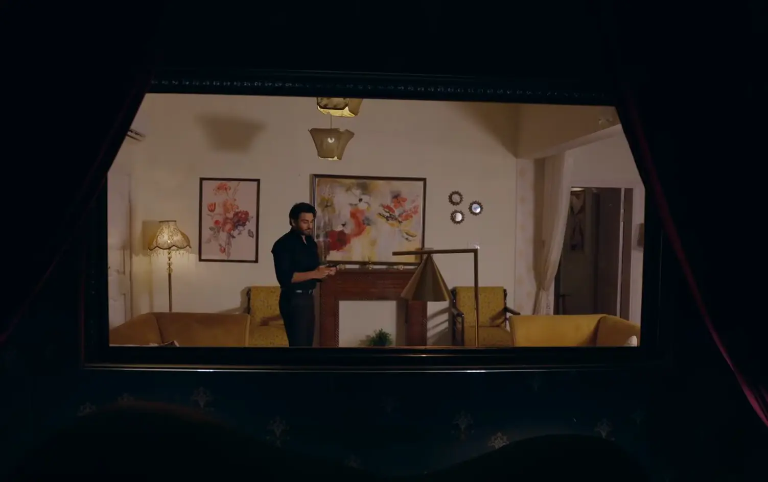 The mirror allows her to look into her tenants&rsquo; home without being seen.