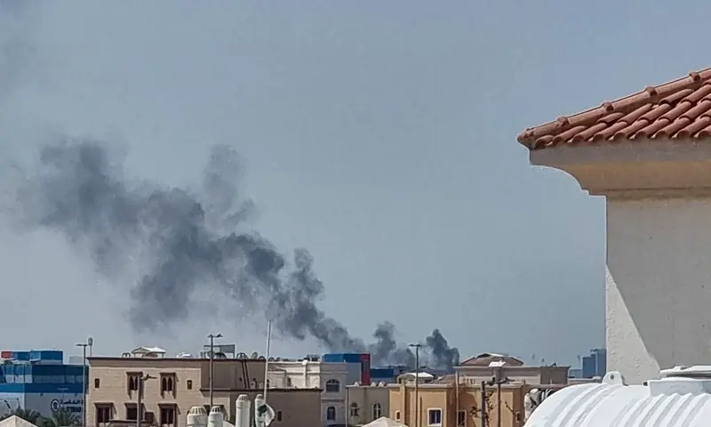 A smoke plume rises over Abu Dhabi from the site of an Iranian missile strike on February 28, 2026. &mdash; AFP