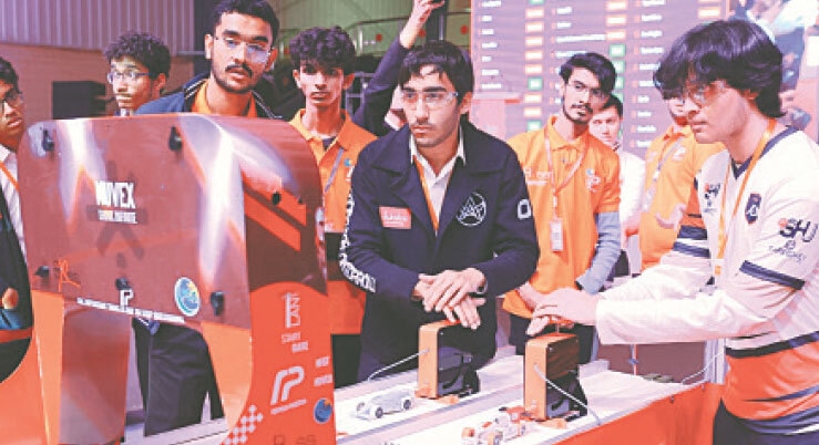  Contestants about to press the buzzer at the start of the race.&mdash;Dawn 