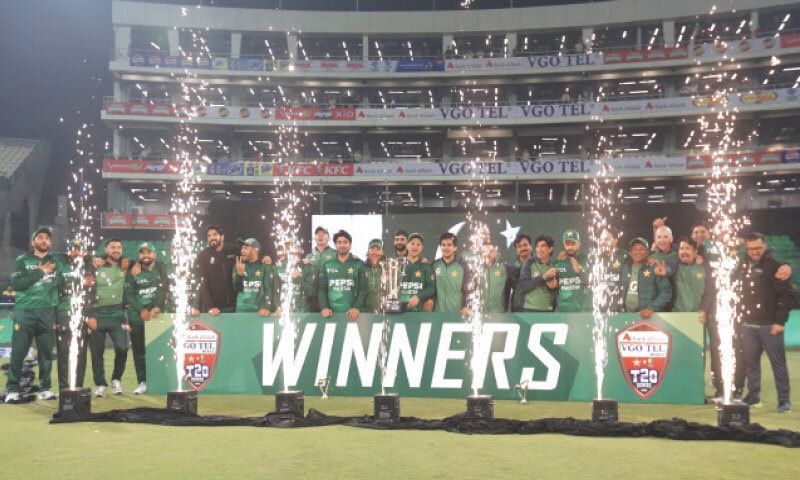 PAKISTAN players and officials celebrate with the T20 International series trophy after defeating Australia in the third match at the Gaddafi Stadium on Sunday.&mdash;M. Arif/White Star