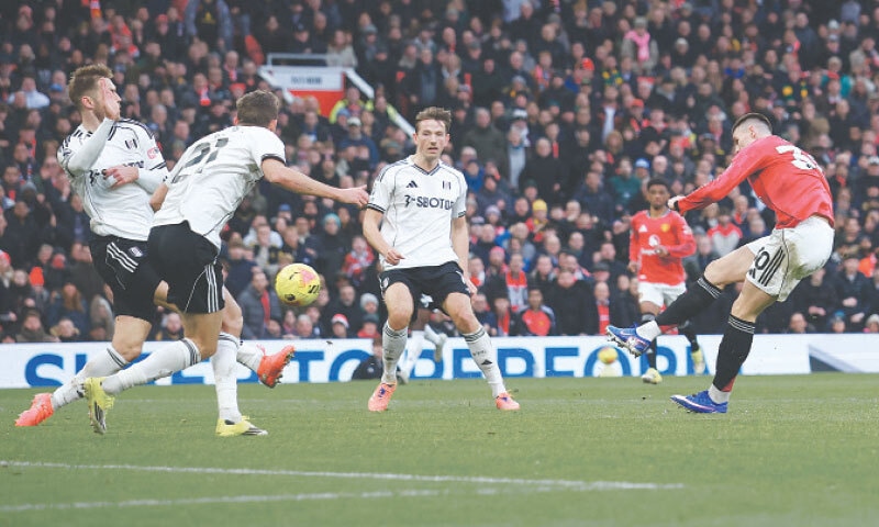 MANCHESTER: Benjamin Sesko (R) of Manchester United scores against Fulhan during their Premier League match at Old Trafford on Sunday.&mdash;Reuters