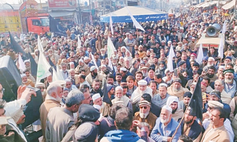 Residents stage a protest at Karnal Sher Khan Chowk, Swabi. — Dawn Residents stage a protest at Karnal Sher Khan Chowk, Swabi. — Dawn