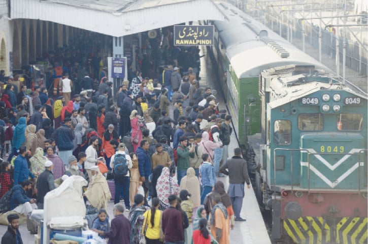  Passengers throng Rawalpindi Railway Station on Thursday to catch a train for Lahore to participate in Basant Festival. &mdash; Photo by Mohammad Asim 