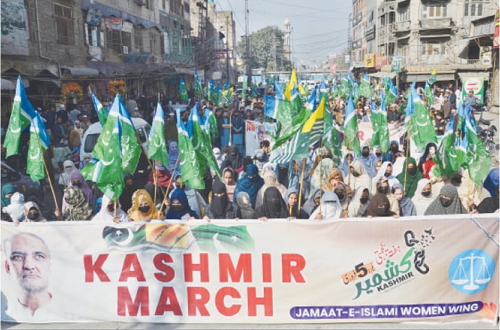 Jamaat-i-Islami activists hold a rally at Hashtnagri, Peshawar, on Thursday to express solidarity with Kashmiris. &mdash; White Star