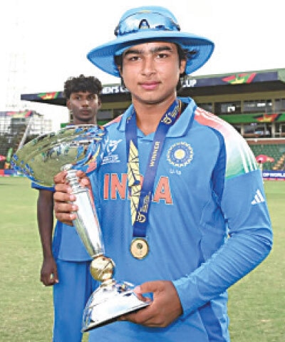 INDIAN opener Vaibhav Suryavanshi holds the U-19 World Cup trophy after winning the final against England on Friday.&mdash;Courtesy ICC