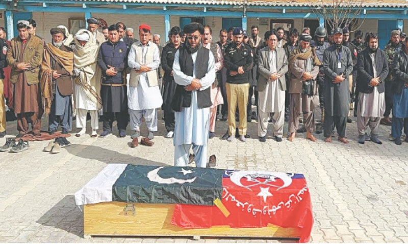 FUNERAL of the martyred policeman is held at Chaman City police station.—Dawn FUNERAL of the martyred policeman is held at Chaman City police station.—Dawn