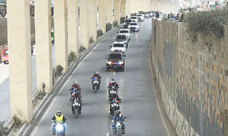 Police conduct a flag march in Rawalpindi on Sunday. — White Star Police conduct a flag march in Rawalpindi on Sunday. — White Star