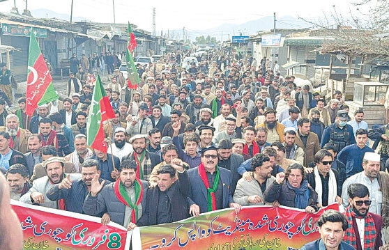 Protesters stage a rally in Bajaur on Sunday. &mdash; Dawn