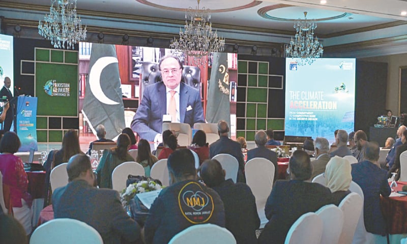 Participants listen to Finance Minister Muhammad Aurangzeb’s recorded message at the OICCI’s climate conference.—APP Participants listen to Finance Minister Muhammad Aurangzeb’s recorded message at the OICCI’s climate conference.—APP