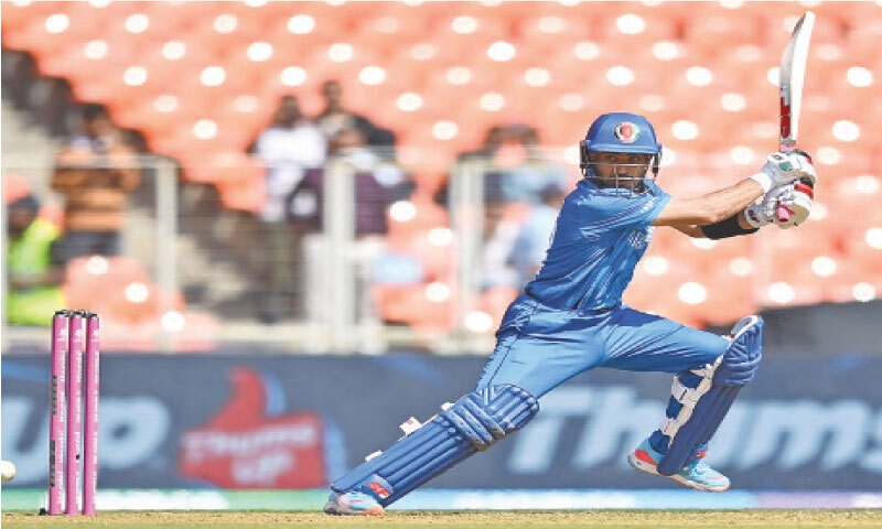 AHMEDABAD: Afghanistan opener Rahmanullah Gurbaz plays a shot during the match against South Africa at the Narendra Modi Stadium on Wednesday.—AFP AHMEDABAD: Afghanistan opener Rahmanullah Gurbaz plays a shot during the match against South Africa at the Narendra Modi Stadium on Wednesday.—AFP