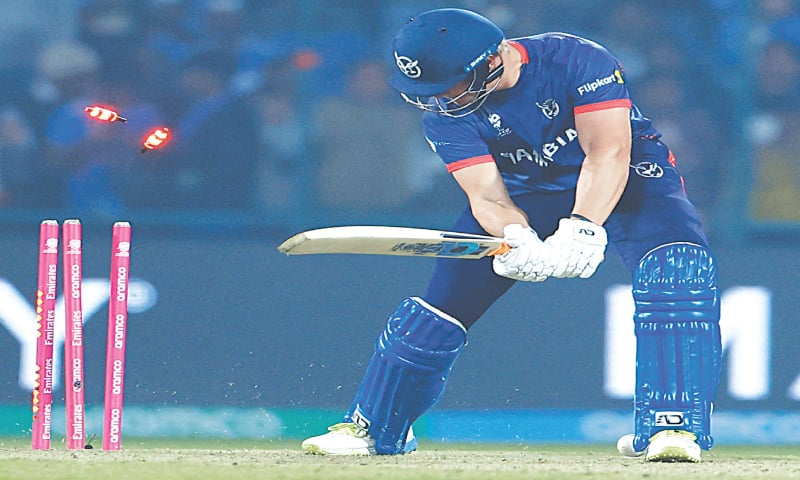 NEW DELHI: Namibian batter Ruben Trumpelmann is cleaned up by Indian fast bowler Jasprit Bumrah during their group match at the Arun Jaitley Stadium on Thursday.—Reuters NEW DELHI: Namibian batter Ruben Trumpelmann is cleaned up by Indian fast bowler Jasprit Bumrah during their group match at the Arun Jaitley Stadium on Thursday.—Reuters
