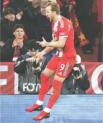 MUNICH: Bayern Munich&rsquo;s Harry Kane celebrates after scoring against RB Leipzig during their DFB Pokal quarter-final at the Allianz Arena.&mdash;Reuters