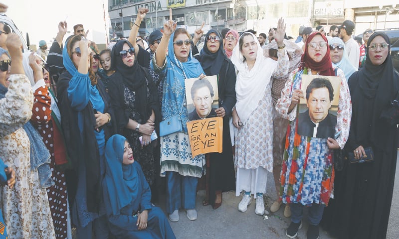 Women activists of the PTI shout slogans for the release of party founder Imran Khan.—Shakil Adil / White Star Women activists of the PTI shout slogans for the release of party founder Imran Khan.—Shakil Adil / White Star