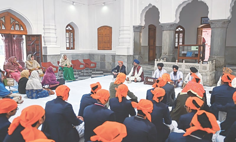 Current and ex-students and members of the Sikh community take part in a Keertan ceremony, held as part of the institution’s 140th Founder’s Day celebrations.—Courtesy Aitchison College Current and ex-students and members of the Sikh community take part in a Keertan ceremony, held as part of the institution’s 140th Founder’s Day celebrations.—Courtesy Aitchison College