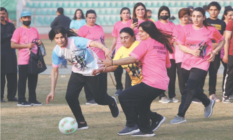 Transgender persons in action during a football match at Peshawar Sports Complex on Saturday. — Photo by Shahbaz Butt Transgender persons in action during a football match at Peshawar Sports Complex on Saturday. — Photo by Shahbaz Butt