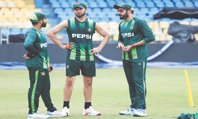 PAKISTAN bowlers Shadab Khan (L), Shaheen Shah Afridi (C) and Usman Tariq chat during a training session at the R. Premadasa Stadium on Saturday.&mdash;Courtesy PCB
