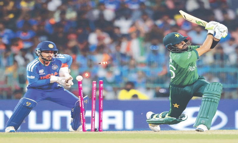 COLOMBO: Pakistan batter Babar Azam is clean bowled by India&rsquo;s Axar Patel after attempting to slog the spinner over long on, during their high-profile T20 World Cup encounter.&mdash;Reuters