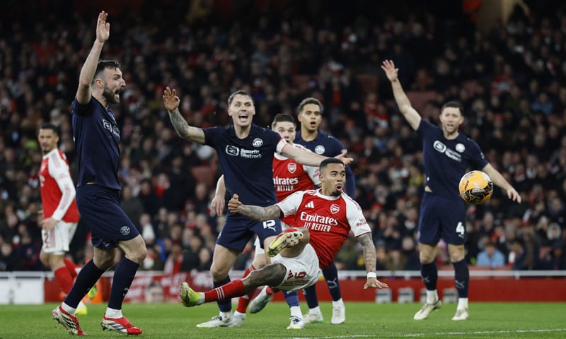 LONDON: Arsenal&rsquo;s Gabriel Jesus (C, front) shoots to score during the  FA Cup fourth-round match against Wigan Athletic at the Emirates Stadium.&mdash;Reuters