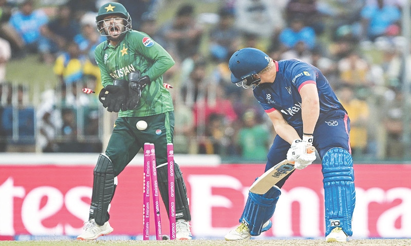 COLOMBO: Namibian tailender Ruben Trumpelmann (R) is clean bowled by Pakistan spinner Usman Tariq during their group stage match at the Sinhalese Sports Club on Wednesday.&mdash;AFP