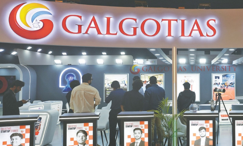 VISITORS stand at the Galgotias University kiosk at AI Impact Summit.—Reuters VISITORS stand at the Galgotias University kiosk at AI Impact Summit.—Reuters