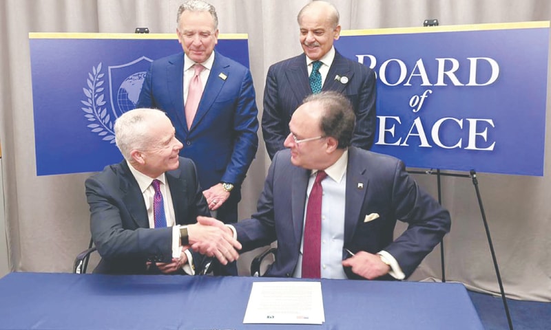 WASHINGTON: GSA Administrator Edward C. Forst and Finance Minister Muhammad Aurangzeb shake hands after signing an MoU.&mdash;PPI