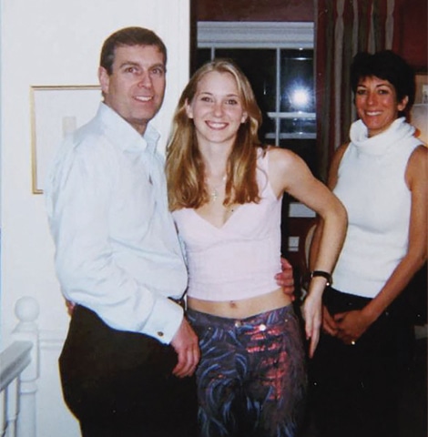 The now-infamous photo of then-Prince Andrew and Ghislaine Maxwell posing with Virginia Giuffre.&mdash;AFP